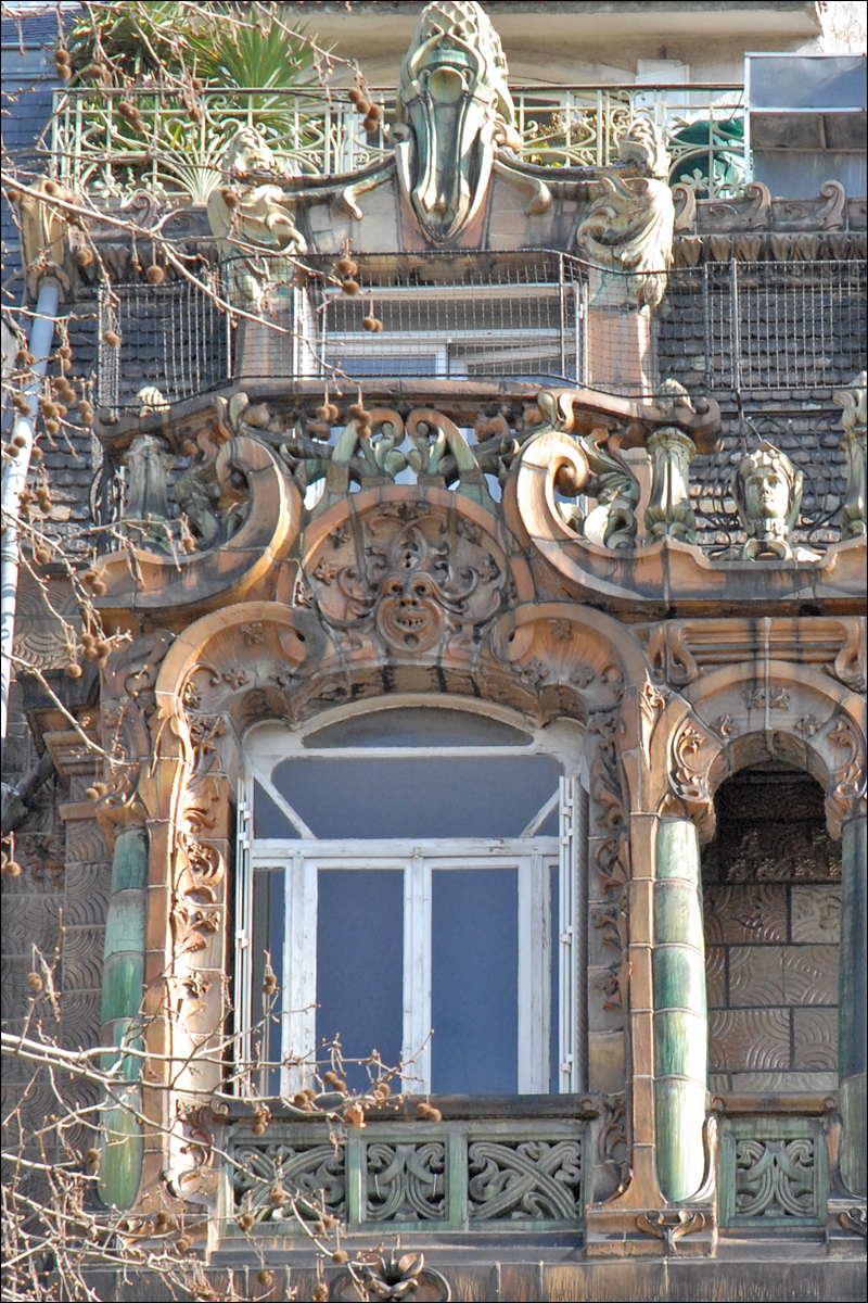 Art Nouveau facade of the Immeuble Lavirotte by Jules Lavirotte in Paris, featuring intricate sculptures and decorative elements.