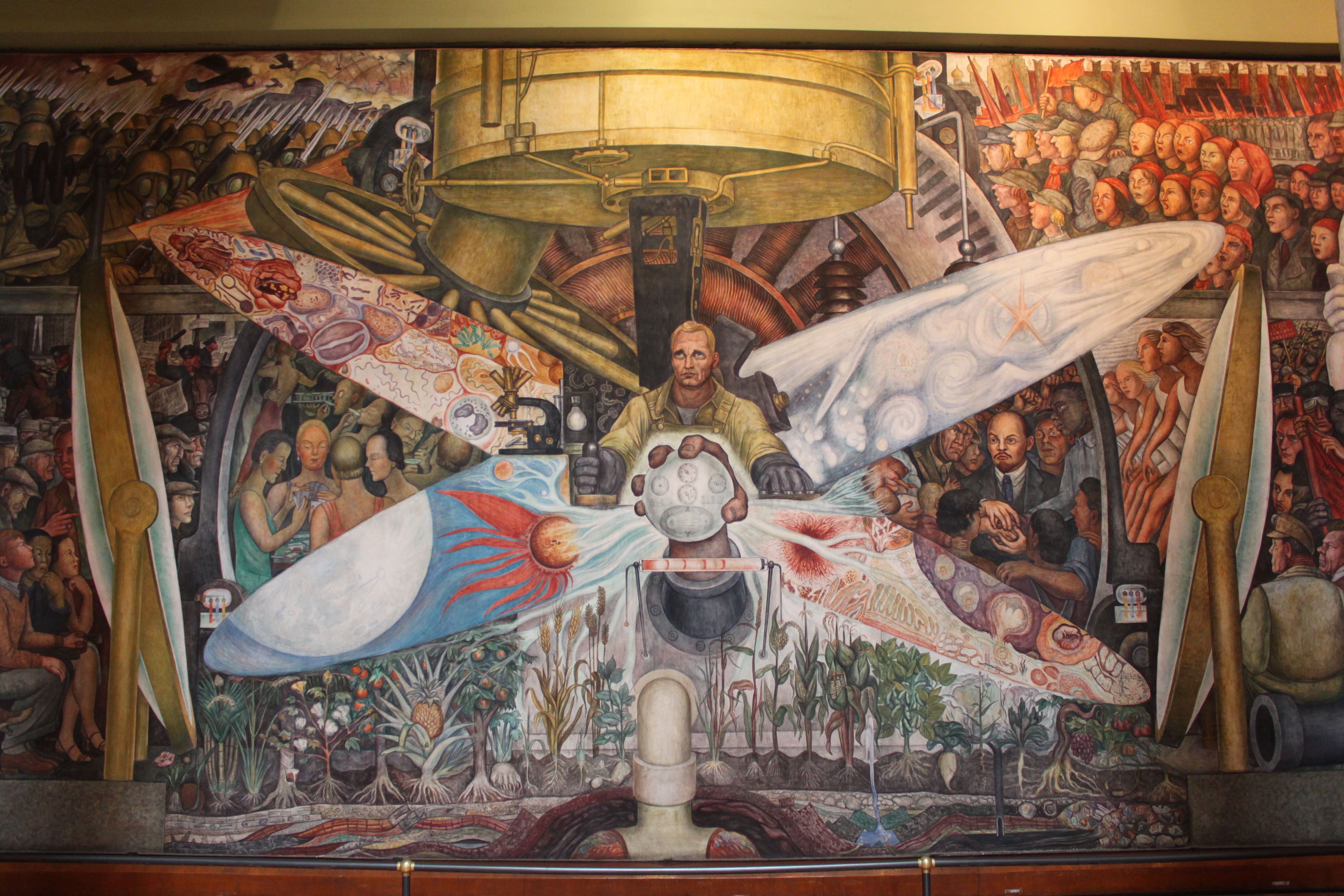 Diego Rivera's 'Man at the Crossroads' mural, depicting a central figure at a crossroads of technology, industry, and social ideologies.