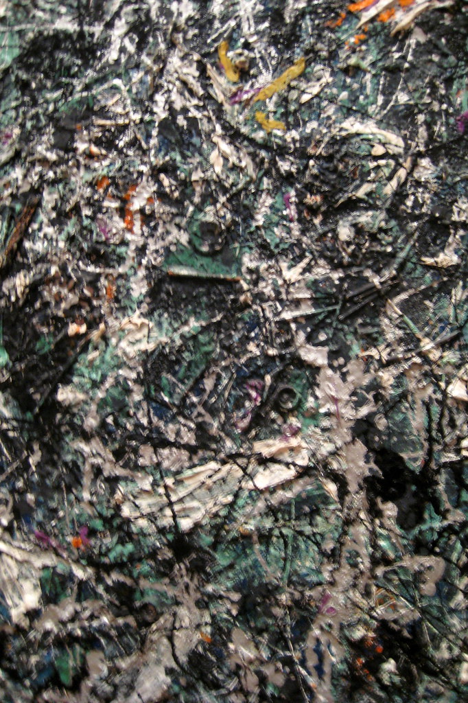 Close-up detail of Jackson Pollock's abstract expressionist painting 'Full Fathom Five', showcasing intricate layers of paint and texture.