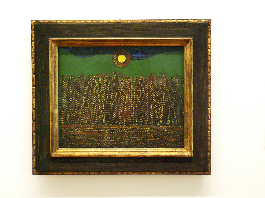 Max Ernst's 'Grätenwald' (Fish-bone Forest) painting, showcasing frottage and grattage techniques with a surreal landscape.