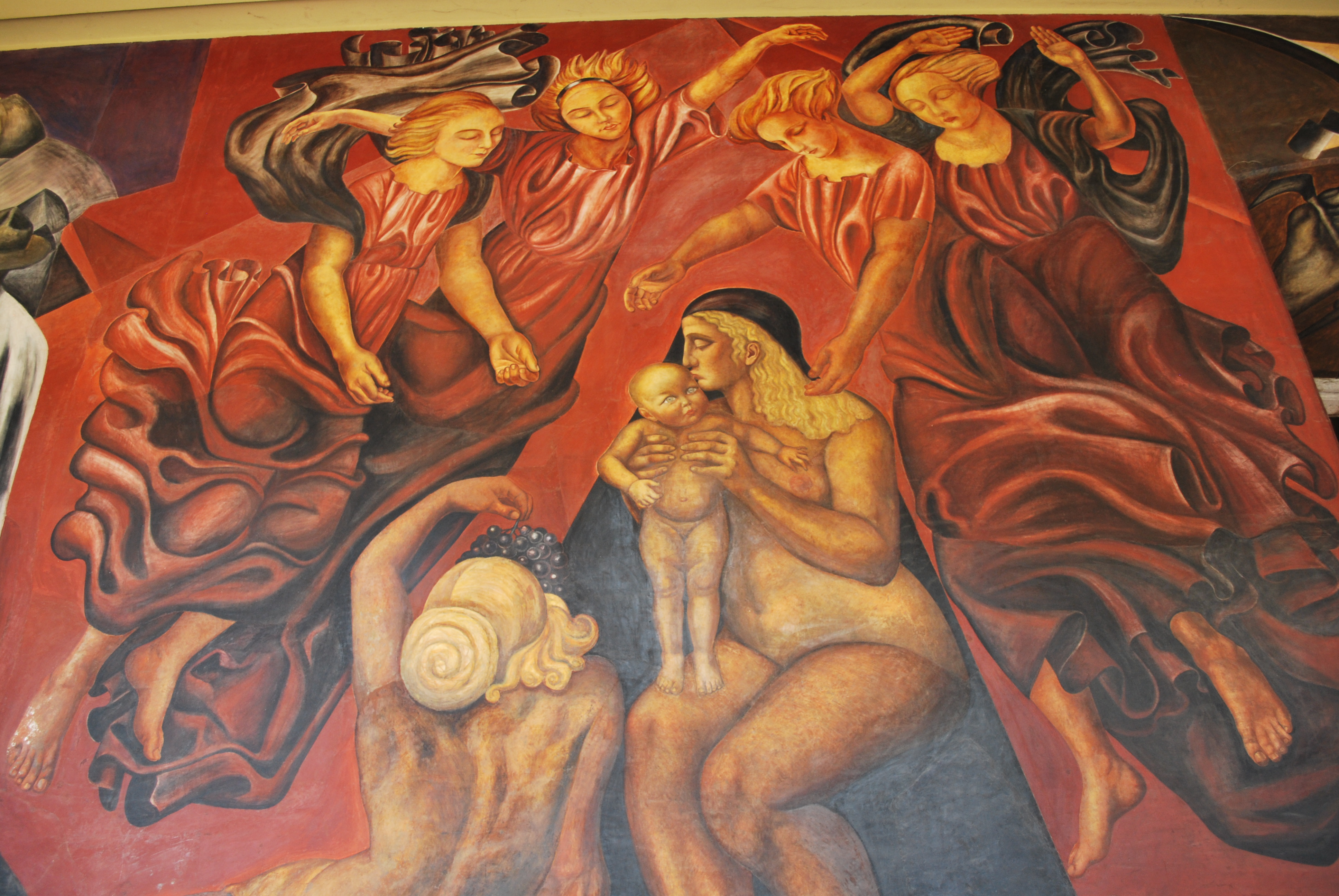 Mexican mural by Orozco depicting motherhood and the future generation amidst social and political revolution.