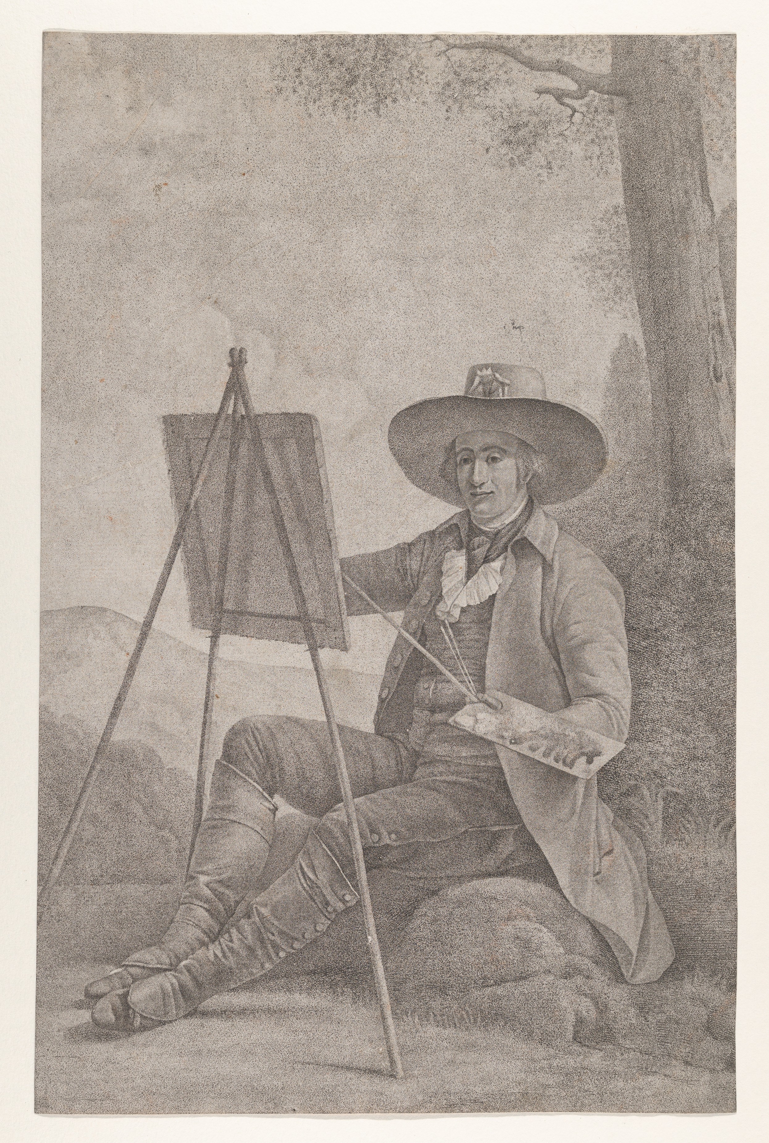 Plein air painter with a wide-brimmed hat sits outdoors, painting on an easel with a palette and brush in hand.