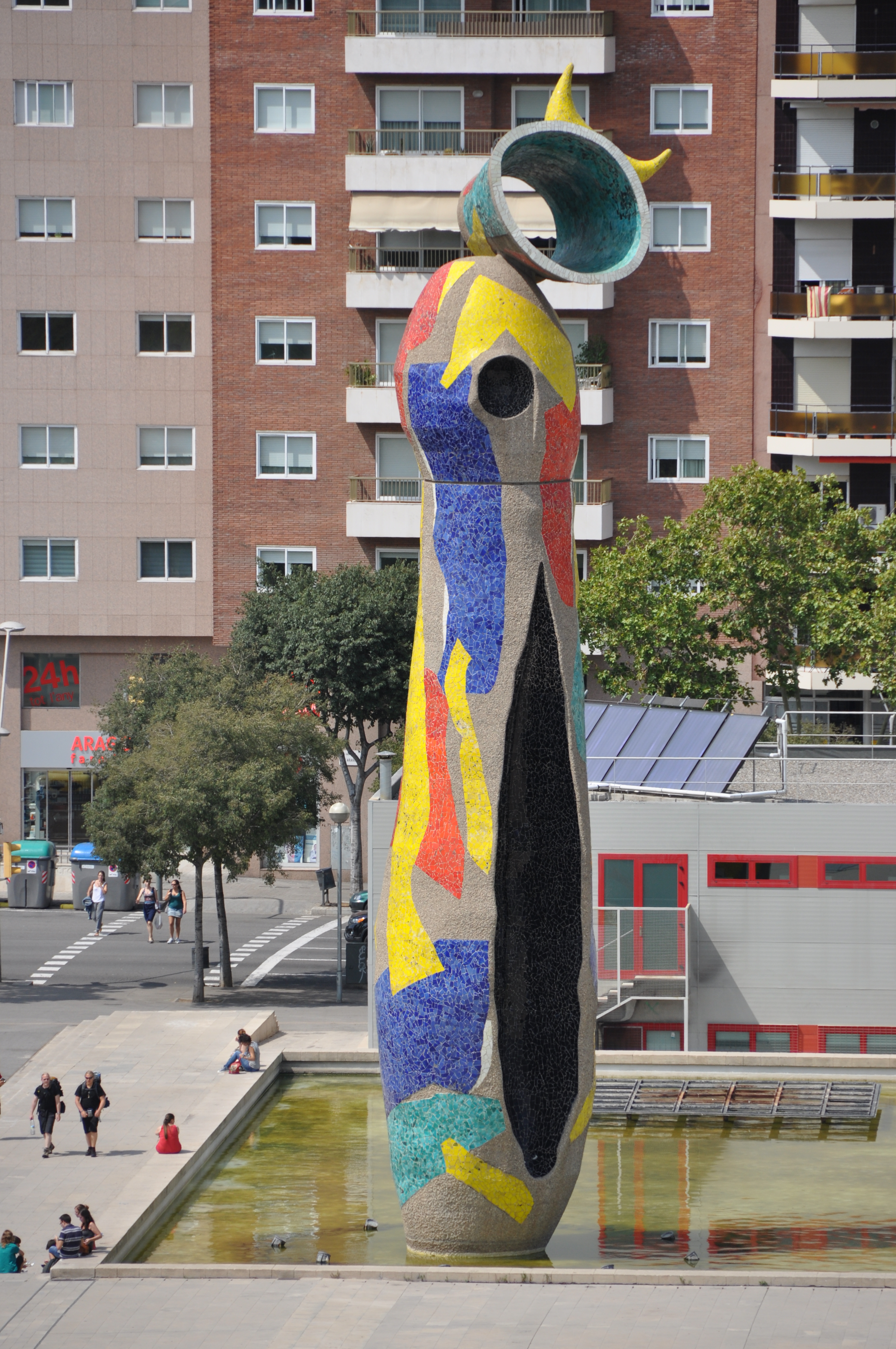 The colorful mosaic sculpture 'Dona i ocell' by Joan Miró, located in Parc de Joan Miró, Barcelona.