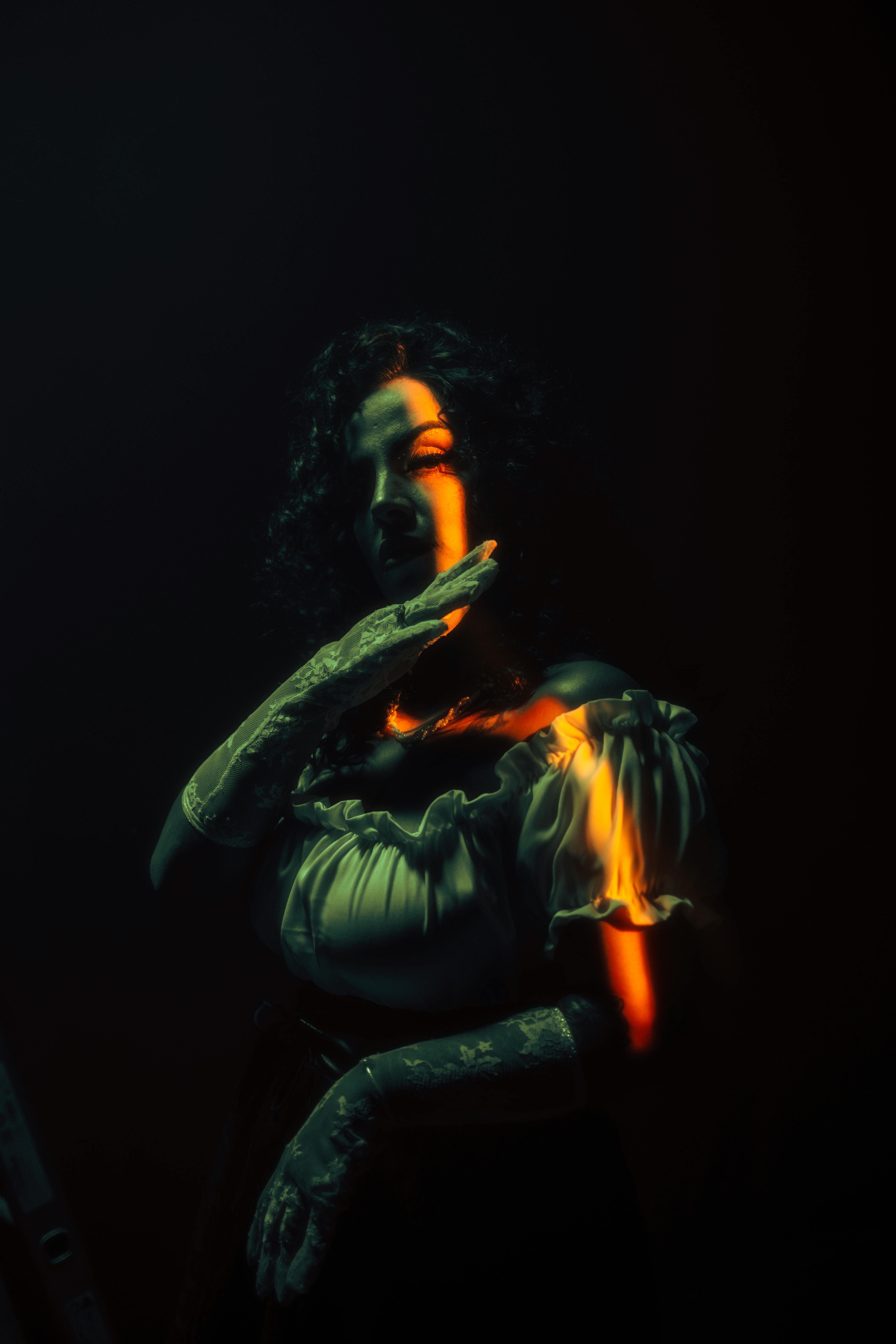 Woman in Light and Shadow: Artistic Lighting Photography