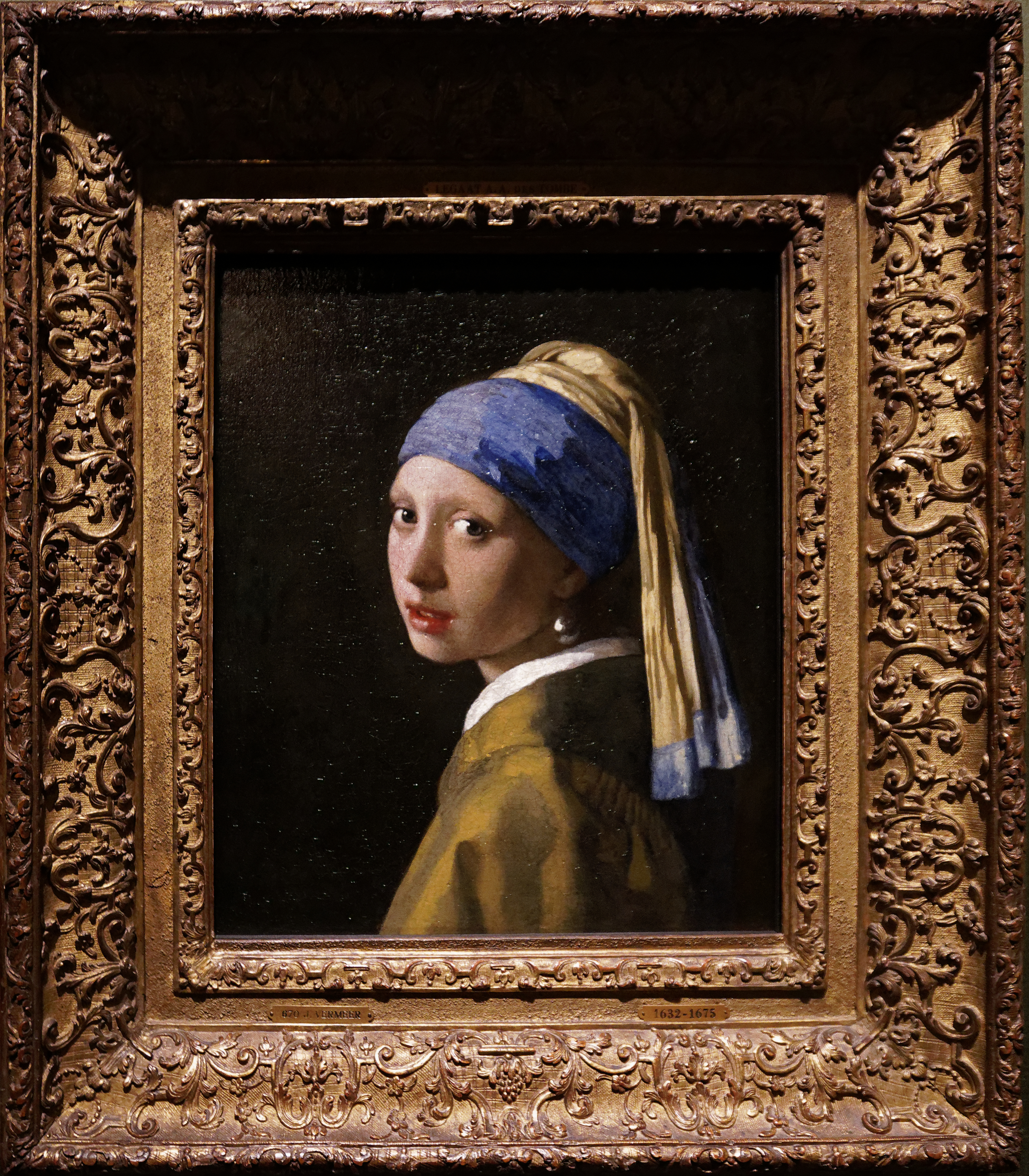 Girl with a Pearl Earring by Johannes Vermeer, a famous Baroque painting.