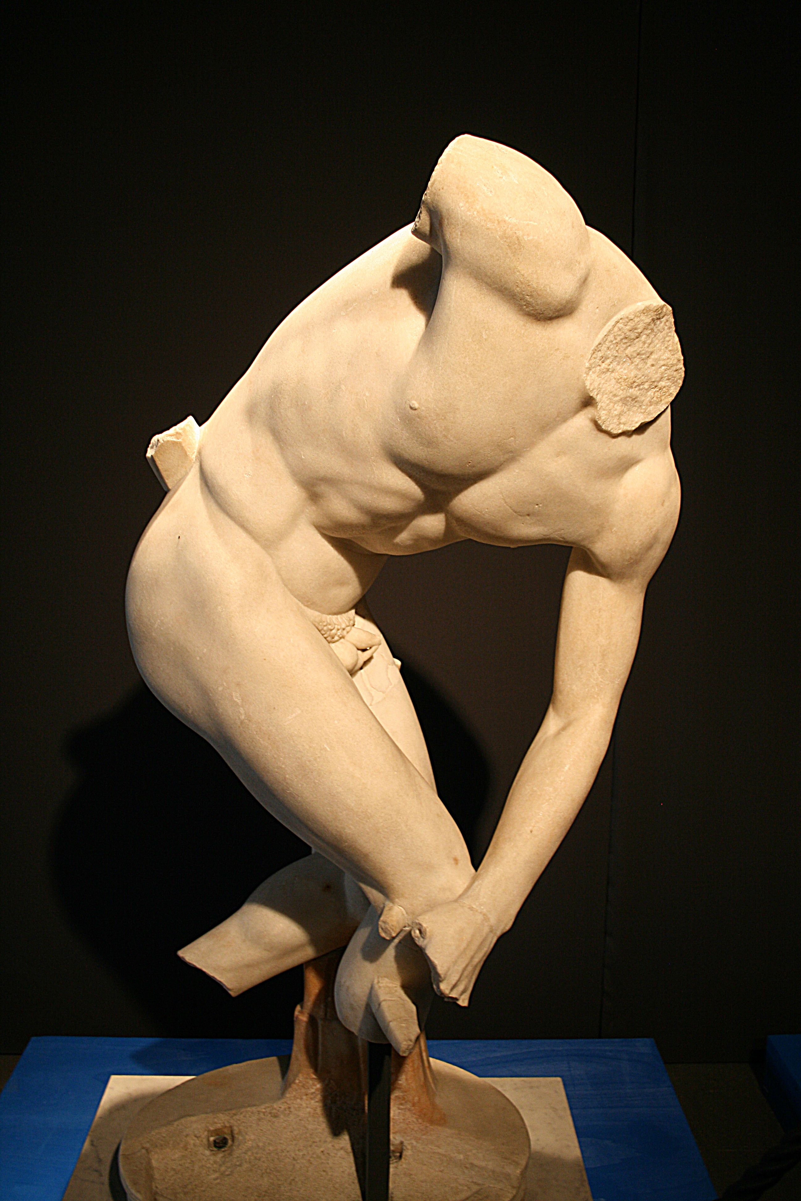 The Discobolus of Myron, a Roman marble copy of a lost Greek bronze original, depicting an athlete in the dynamic pose of throwing a discus.