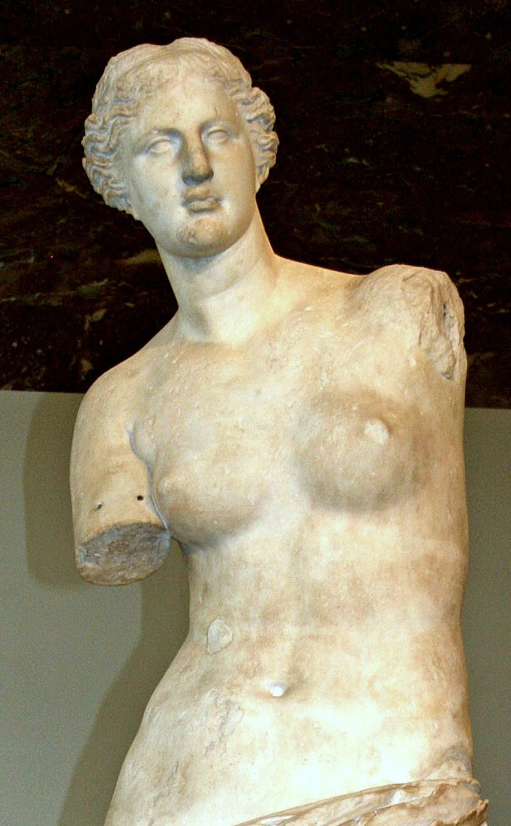 The Venus de Milo, an ancient Greek marble statue of Aphrodite, displayed in the Louvre Museum.