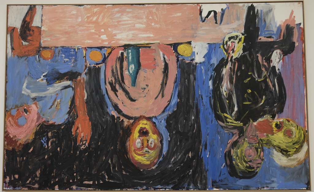 Abstract expressionist painting by Georg Baselitz featuring inverted figures in pink, blue, black, and yellow.