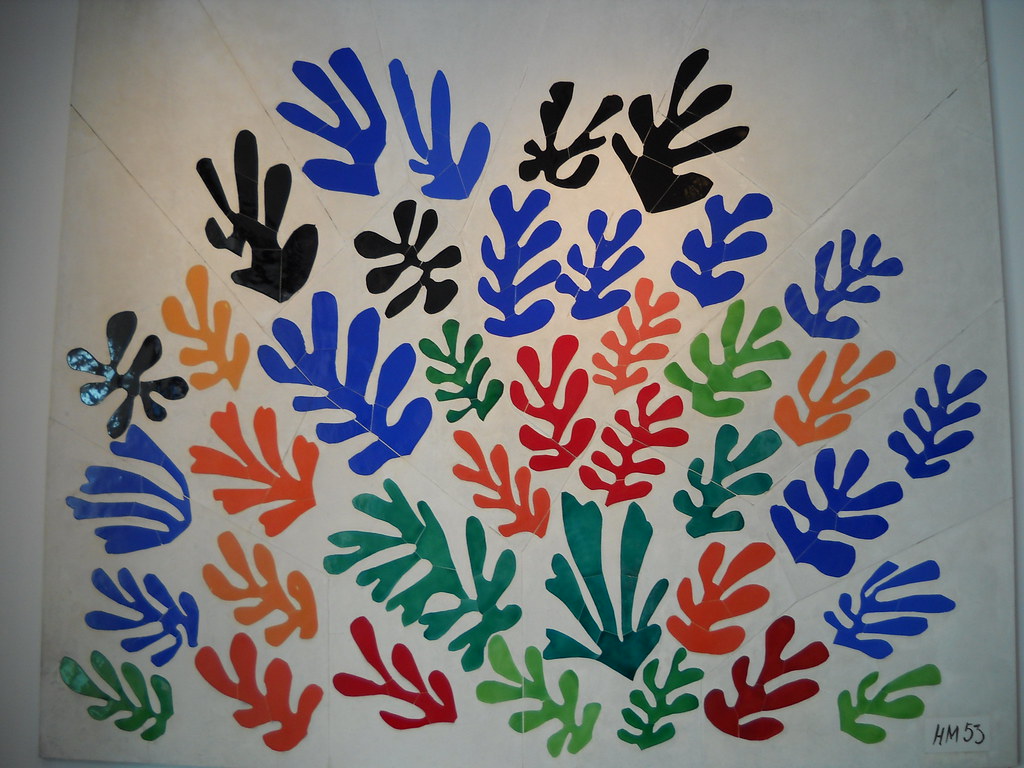 Henri Matisse's La Gerbe (The Sheaf), a 1953 abstract collage featuring colorful leaf-like shapes in blue, black, orange, red, and green.
