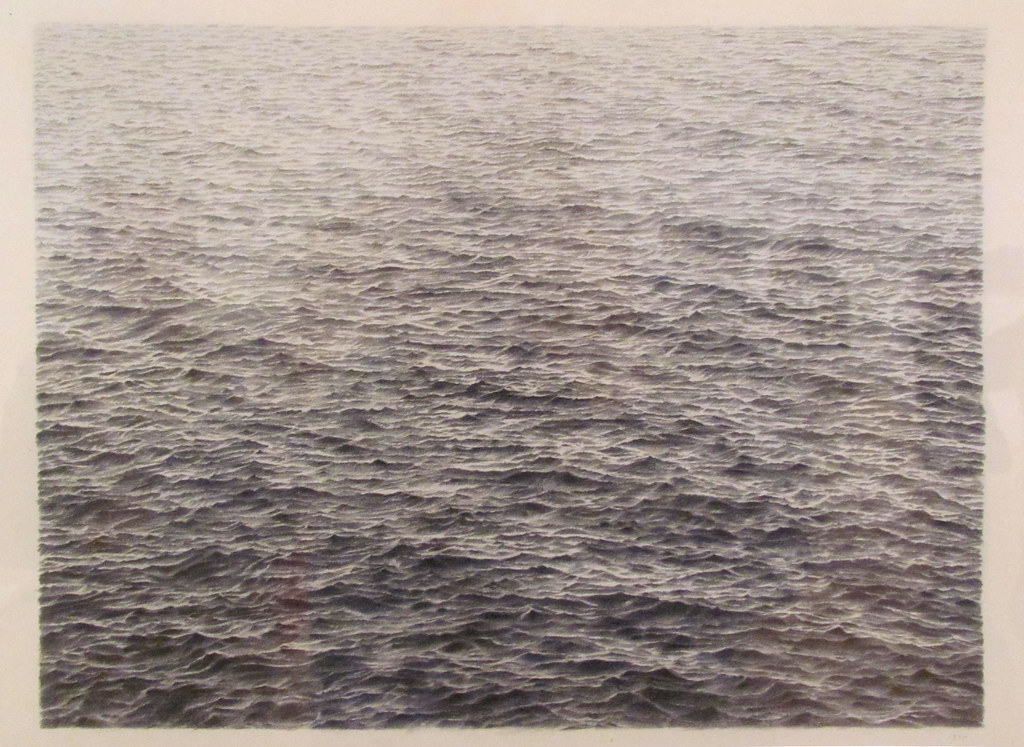 Detailed graphite drawing by Vija Celmins depicting realistic ocean waves.