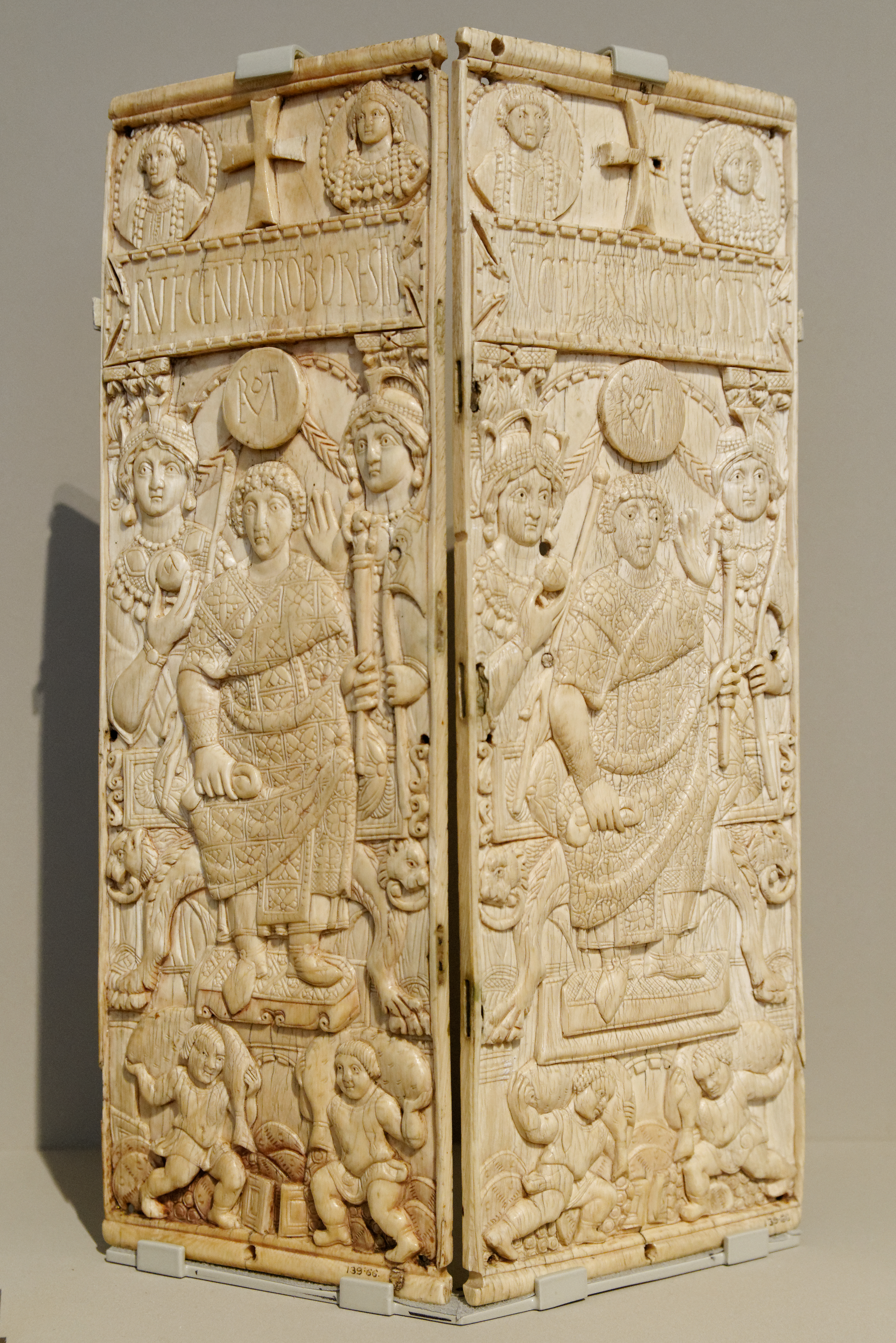 Diptych of Consuls: Rufius Gennadius Probus Orestes, ivory, Constantinople, 534 AD. This diptych, made of ivory, features detailed carvings of figures, inscriptions, and decorative elements. It is a prime example of early Byzantine art and craftsmanship, showcasing the artistic styles and iconographic conventions of the period. The diptych is composed of two panels, hinged together, and is intricately carved with scenes and portraits.