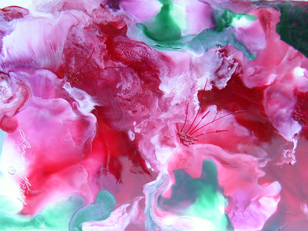 Vibrant pink and red petunia-like flowers created with encaustic beeswax painting technique, showcasing fluid textures and delicate stamen details.